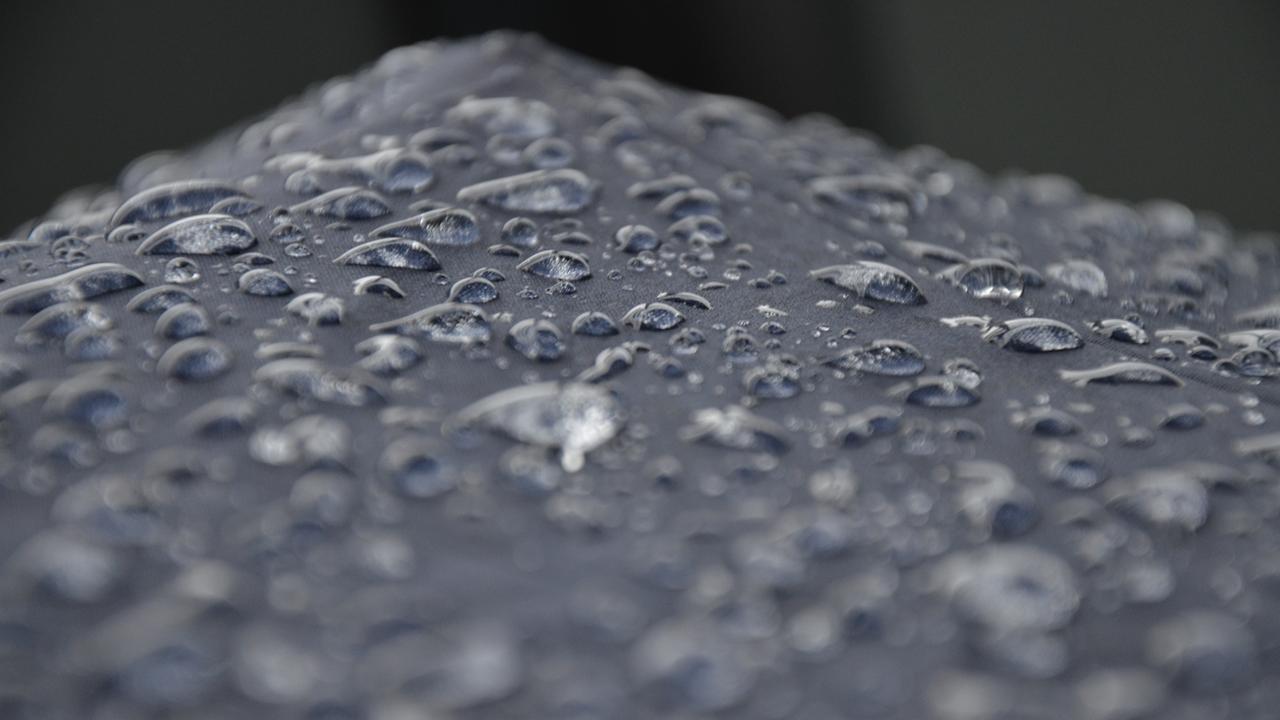 raindrops on a grey surface